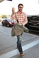 newly single gerard butler catches a solo flight out of lax 01