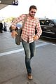 newly single gerard butler catches a solo flight out of lax 09
