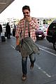 newly single gerard butler catches a solo flight out of lax 16