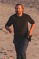 dad to be bradley cooper goes for a run on the beach 02