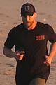 dad to be bradley cooper goes for a run on the beach 04