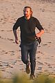 dad to be bradley cooper goes for a run on the beach 09