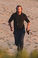 dad to be bradley cooper goes for a run on the beach 10