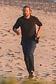 dad to be bradley cooper goes for a run on the beach 13