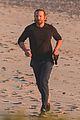 dad to be bradley cooper goes for a run on the beach 14