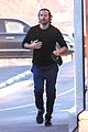 dad to be bradley cooper goes for a run on the beach 15