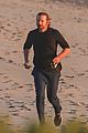 dad to be bradley cooper goes for a run on the beach 17