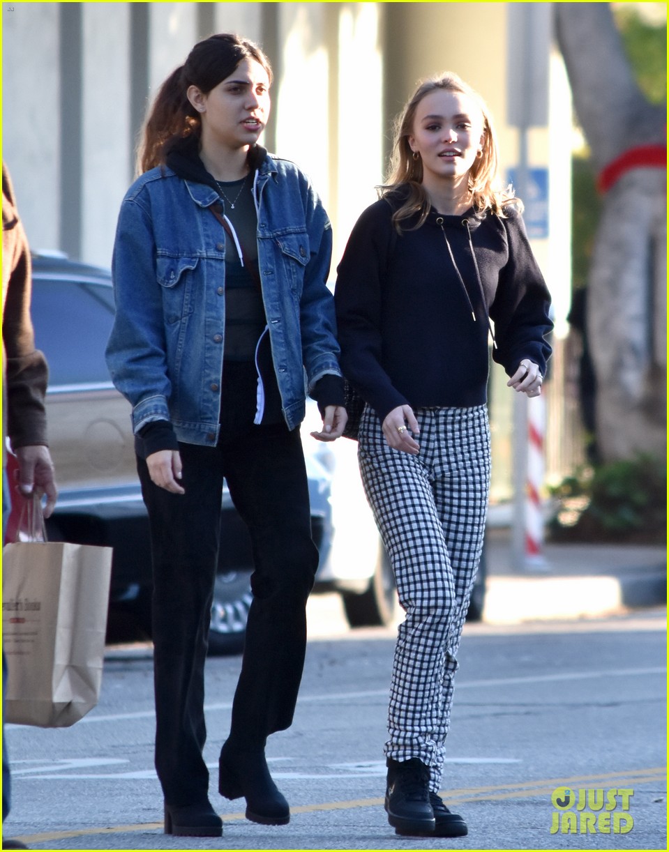 lily rose depp has to put tshirts on her dog so she doesnt scratch herself 063830060