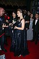 natalie portman holds onto her baby bump at awards 05