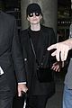 emma stone keeps a low profile while arriving at lax 08
