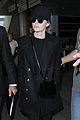 emma stone keeps a low profile while arriving at lax 10