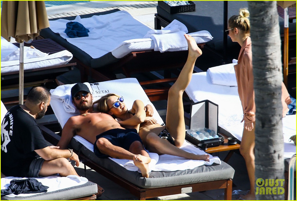 scott disick cuddles by the pool with another woman in miami 053850720