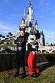 tom hardy buddys up with mickey mouse at disneyland paris season of the force 05