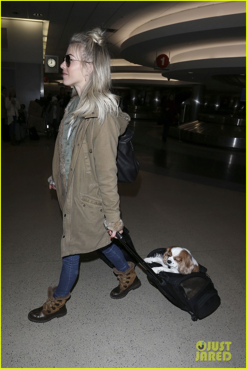 julianne hough makes her way through lax with her pups 05