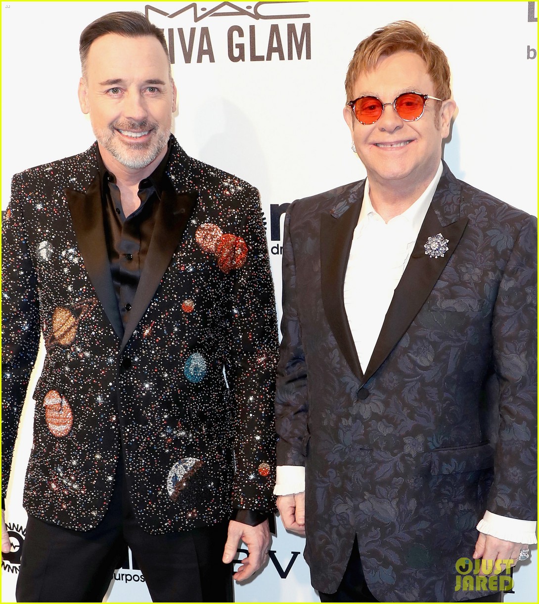 elton john david furnish are out of this world 043867007