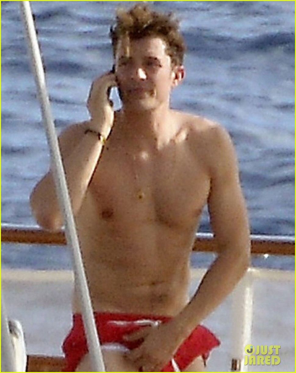 orlando bloom goes rock climbing jumps off a cliff shirtless 043877166