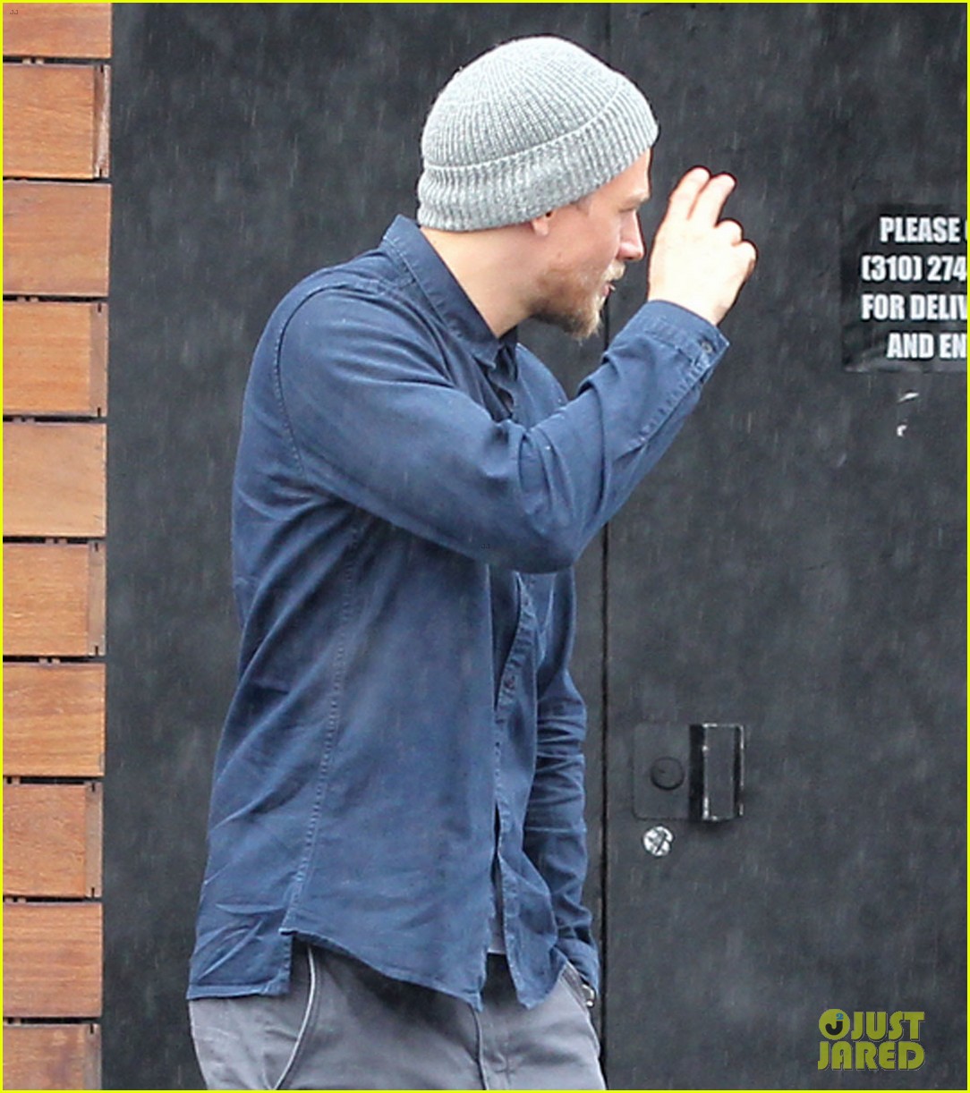 charlie hunnam sticks out his tongue to taste the rain 093877193