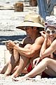 orlando bloom goes shirtless at the beach for memorial day weekend 03