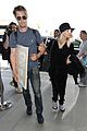 kaley cuoco jets out of town with boyfriend karl cook05