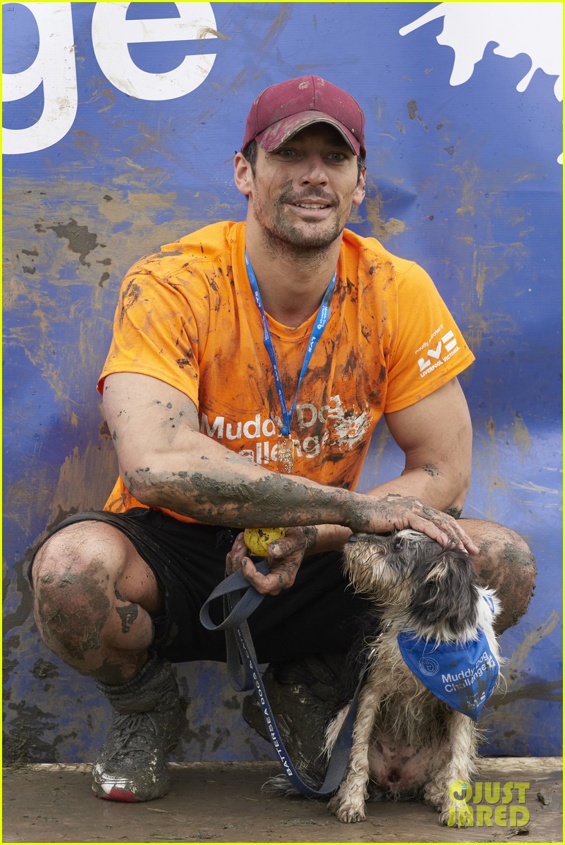 david gandy gets down dirty in the mud with his pup063902447