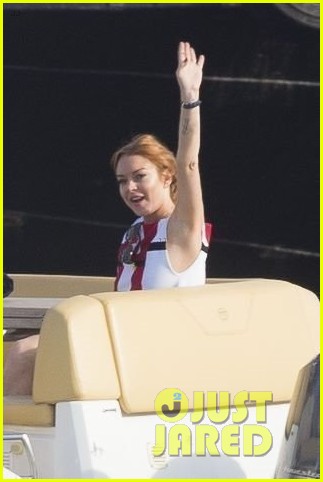lindsay lohan cooks scallops and crab claws on a boat in cannes 013903899