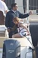 lindsay lohan cooks scallops and crab claws on a boat in cannes 03