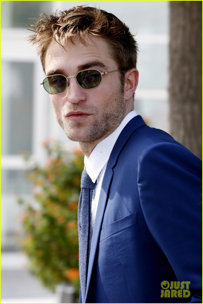 robert pattinson suits up for good time cannes photo call 183905325