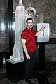 zachary quinto lights the empire state building in honor of nycs aids walk05