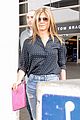 jennifer aniston arrives in la while justin theroux cruises through nyc 01
