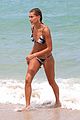 hailey baldwin takes a dip in her camo bikini 07
