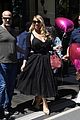 mariah carey holds pink heart balloon in the city of love 02