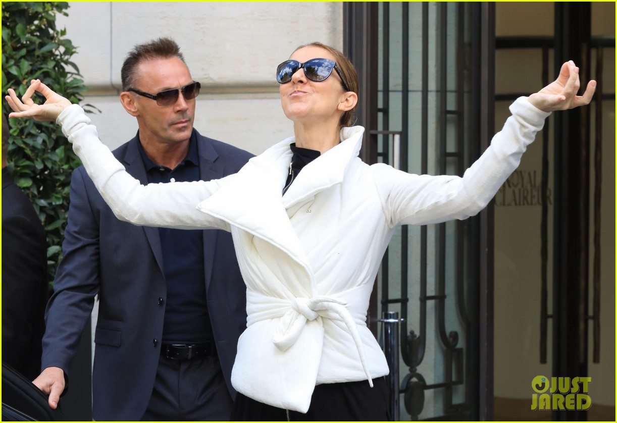 celine dion does yoga poses outside her paris hotel 273918836