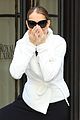 celine dion does yoga poses outside her paris hotel 13