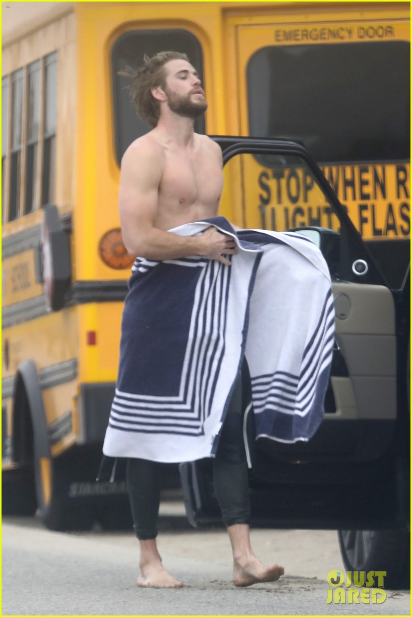 liam hemsworth strips out of wetsuit to reveal ripped abs 283917146