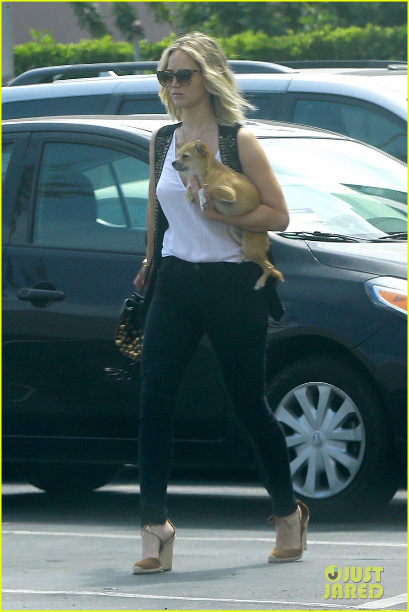 jennifer lawrence holds her dog close while out in westwood 043918969