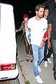 bella thorne scott disick hold hands on night at the club 35