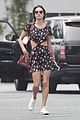alessandra ambrosio plays peekaboo with her abs while shopping 09