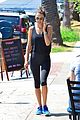 alessandra ambrosio plays peekaboo with her abs while shopping 10