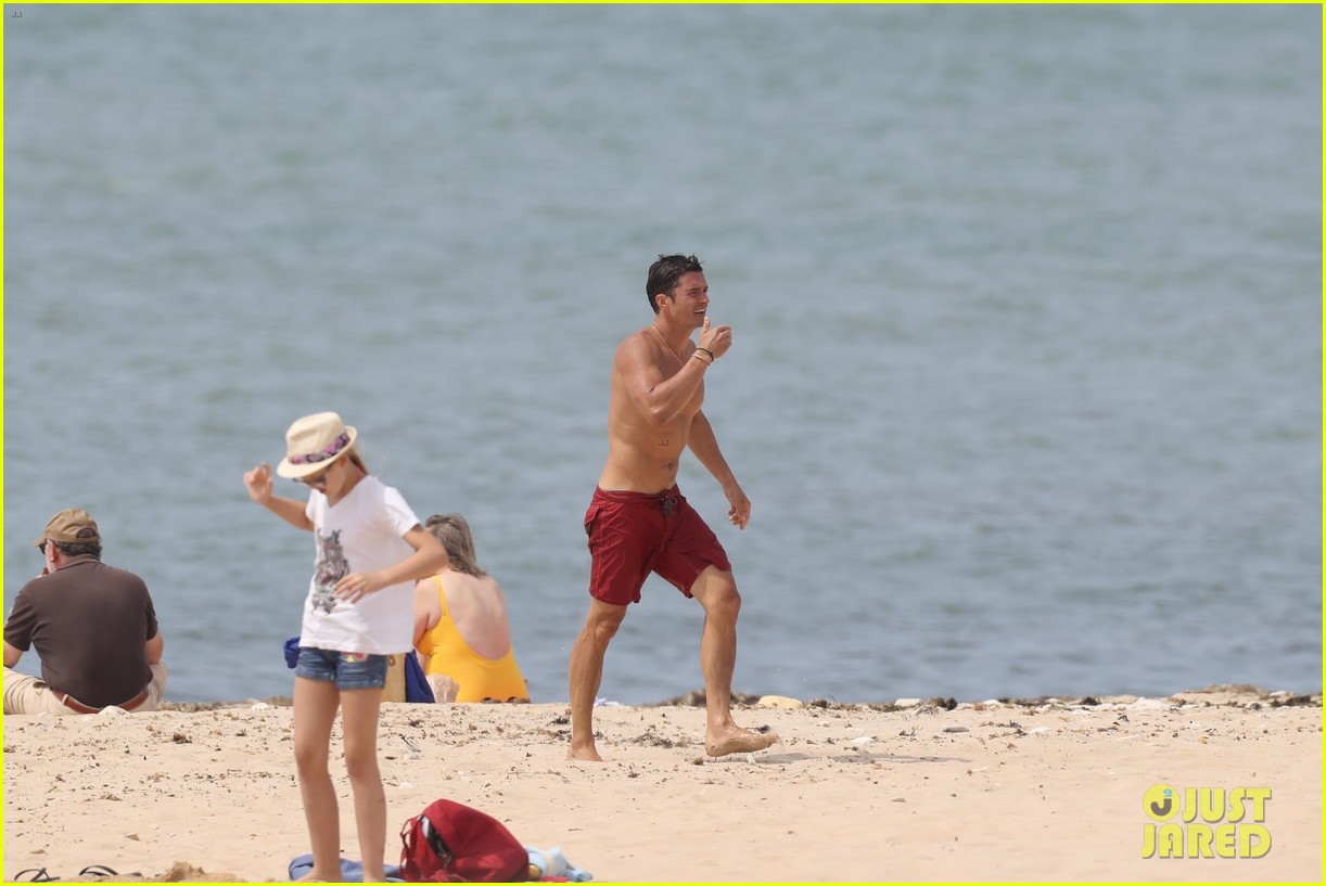 orlando bloom goes shirtless in low riding trunks at the beach 34