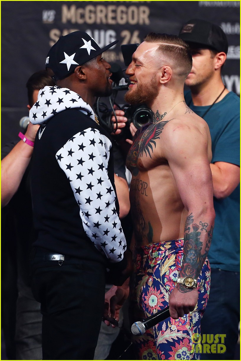 conor mcgregor goes shirtless during press conference with floyd mayweather jr 08
