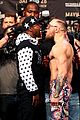 conor mcgregor goes shirtless during press conference with floyd mayweather jr 01