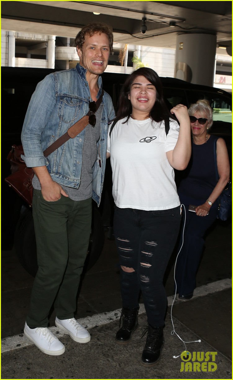 sam heughan greets his fans upon arrival in san diego 013931067