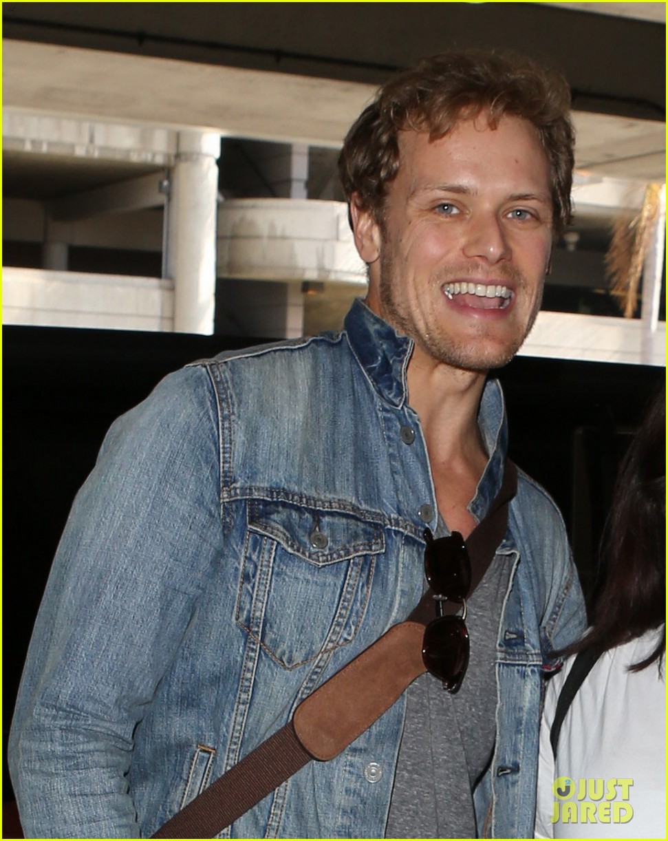 sam heughan greets his fans upon arrival in san diego 06
