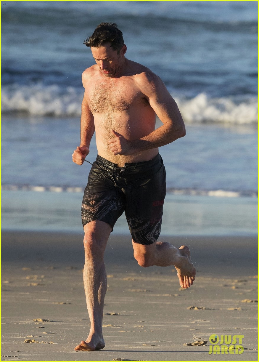 hugh jackman hits the beach with his speedo clad trainer 533935370