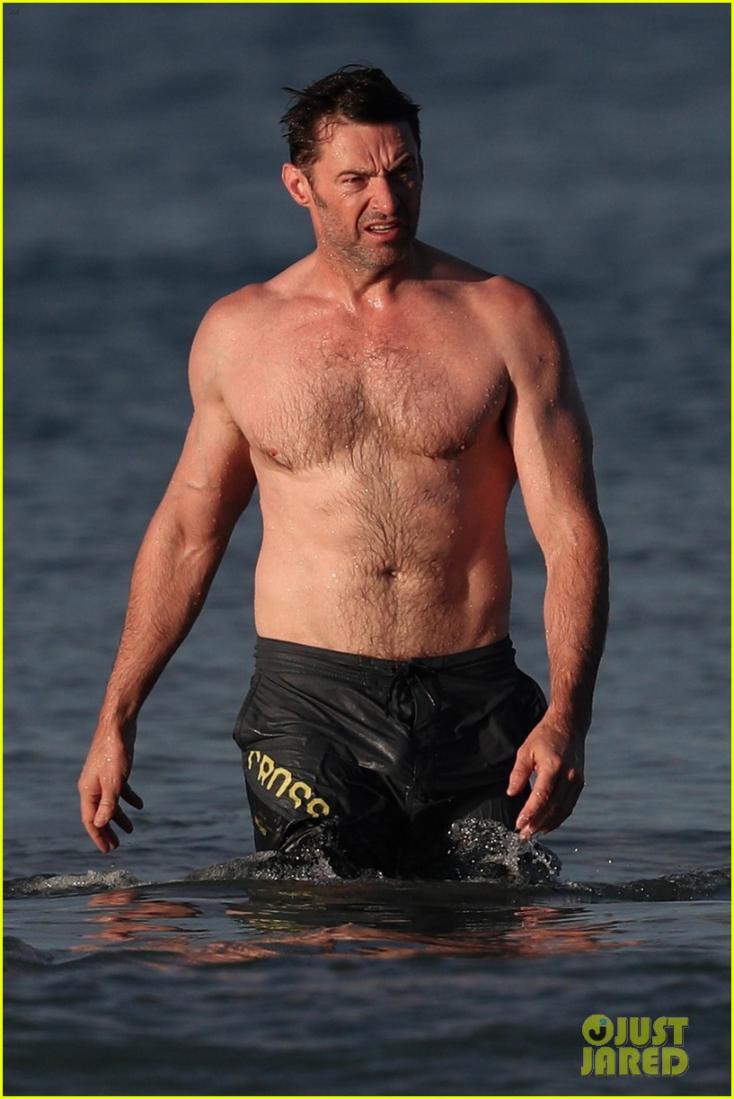 hugh jackman runs shirtless on the beach with his ripped muscles 023935918