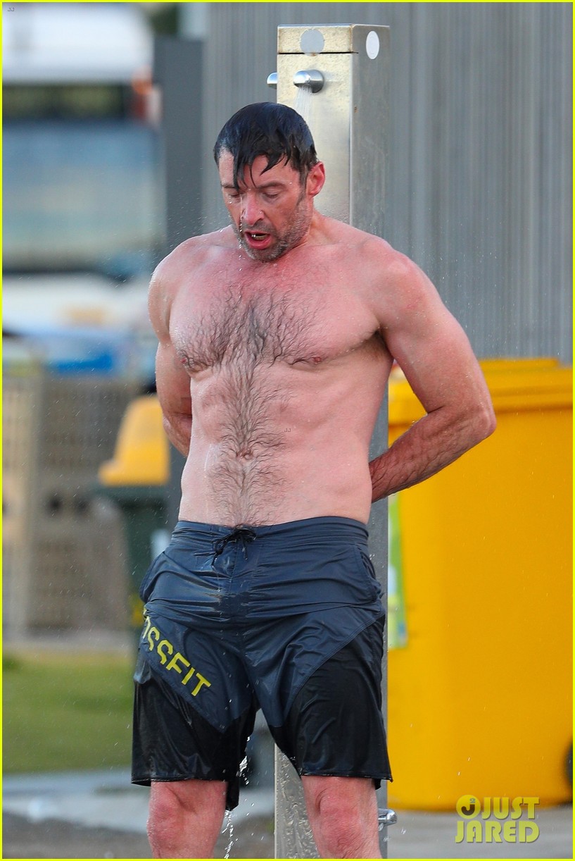 hugh jackman runs shirtless on the beach with his ripped muscles 113935927