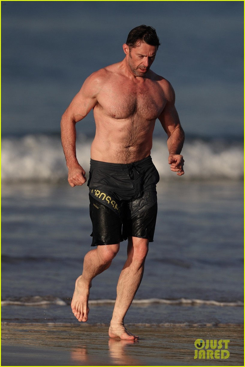 hugh jackman runs shirtless on the beach with his ripped muscles 53