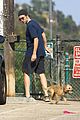 robert pattinson gets in some exercise at the dog park 05