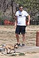 robert pattinson takes his pet pooch to the dog park 04