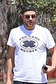 robert pattinson takes his pet pooch to the dog park 05